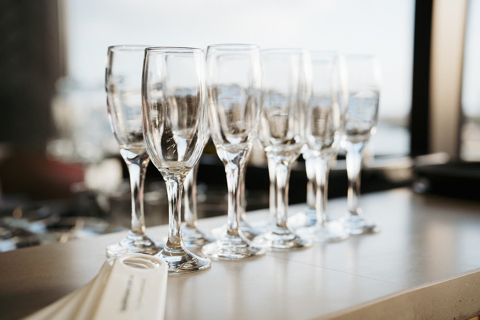 Glasses set out on the bar before guests arrived